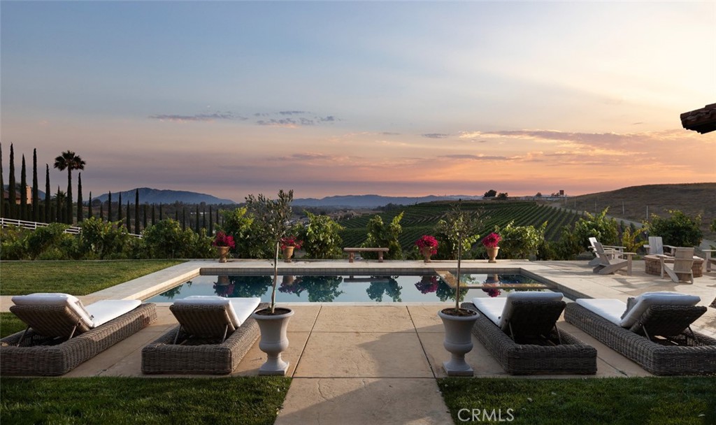 33240 La Serena Way Temecula, CA 92591 - Photo 2 of 75 a view of roof deck with couches and city view
