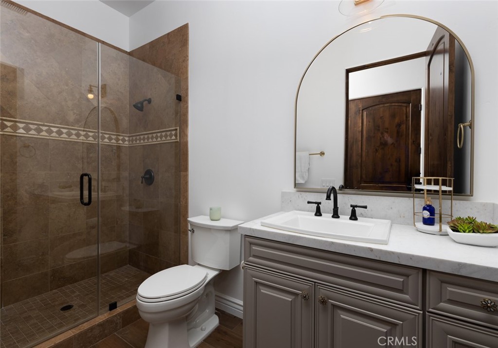 33240 La Serena Way Temecula, CA 92591 - Photo 32 of 75 a bathroom with a sink a toilet and shower
