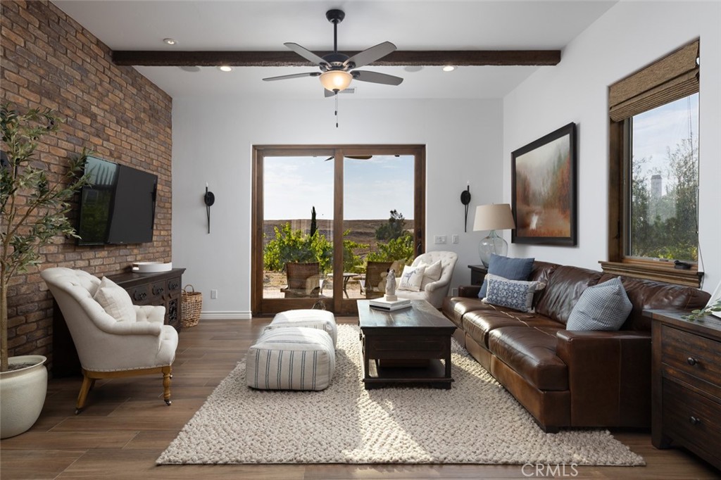 33240 La Serena Way Temecula, CA 92591 - Photo 38 of 75 a living room with furniture and a flat screen tv
