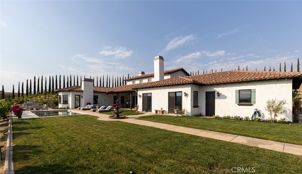 33240 La Serena Way Temecula, CA 92591 - Photo 54 of 75 a view of a house with backyard porch and sitting area