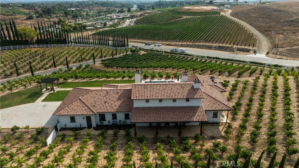 33240 La Serena Way Temecula, CA 92591 - Photo 71 of 75 an aerial view of a house with a garden
