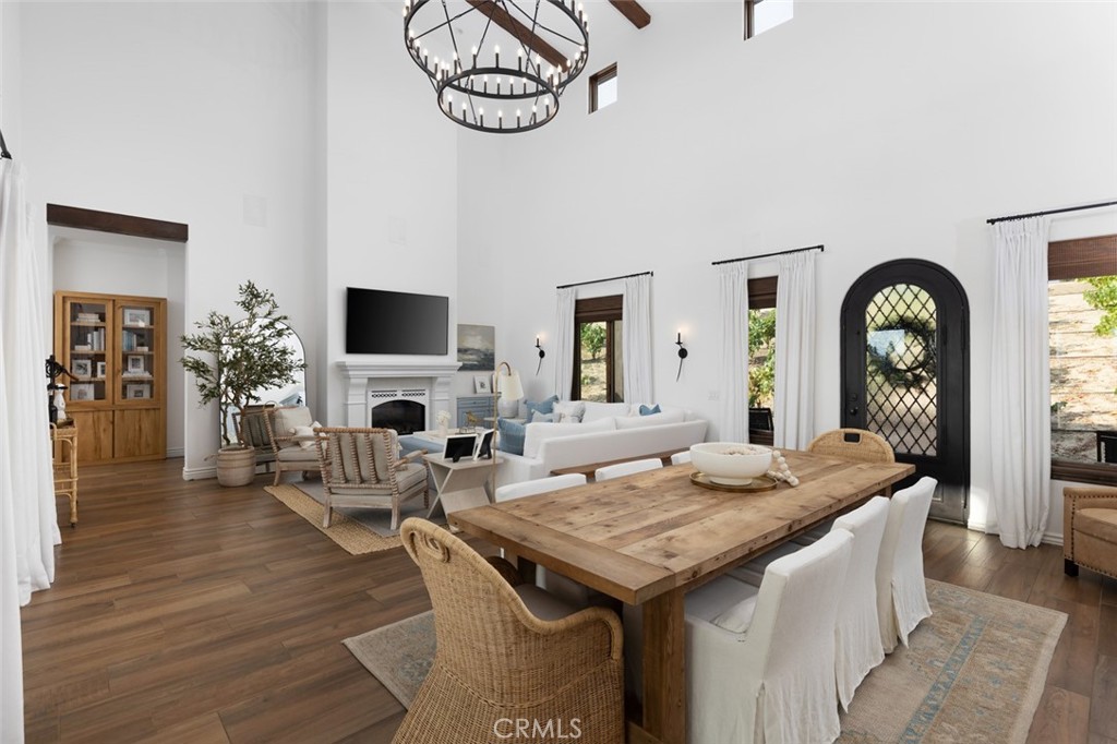 33240 La Serena Way Temecula, CA 92591 - Photo 8 of 75 a living room with fireplace furniture and a table