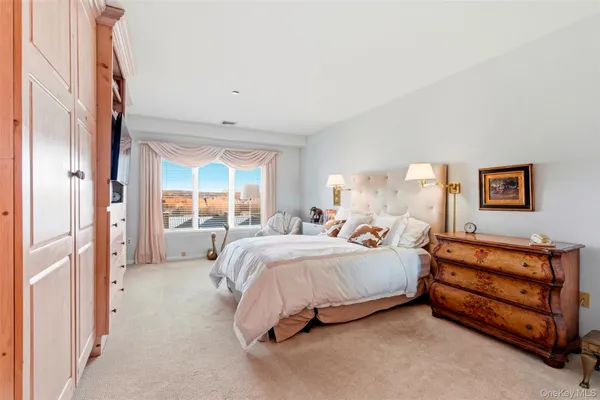 a bed room with a bed and a window