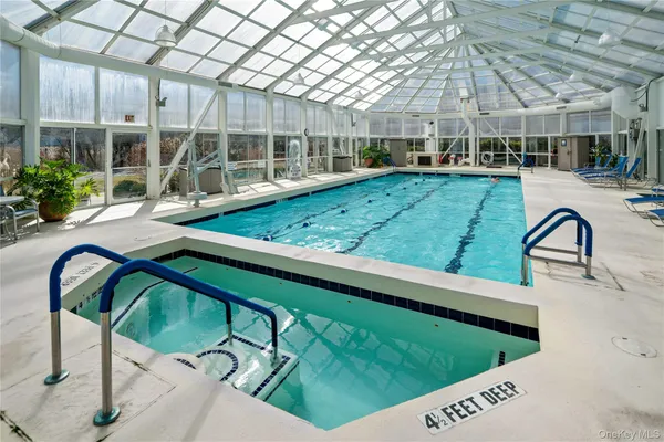 a view of a backyard with sitting area