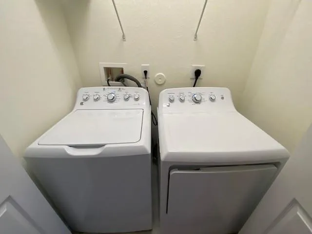 a utility room with dryer and washer