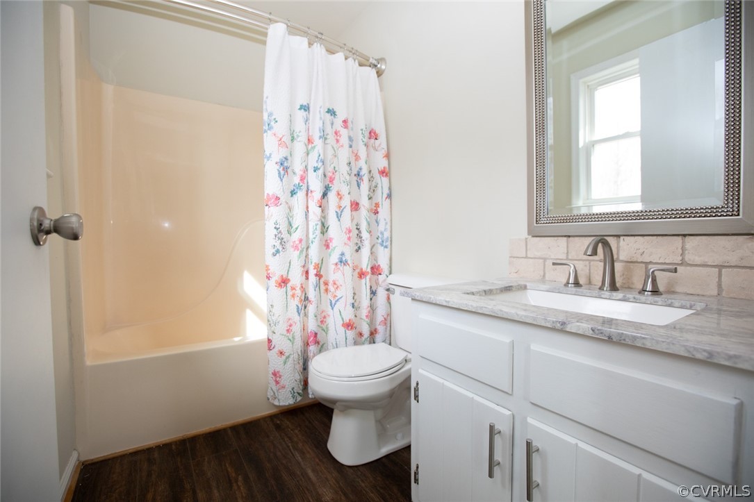 37 Criss Road Cumberland, VA 23040 - Photo 21 of 40 a bathroom with a granite countertop sink toilet and shower