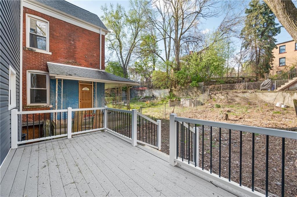 5419 Broad Street Pittsburgh, PA 15206 - Photo 26 of 29 a view of a house with a wooden deck