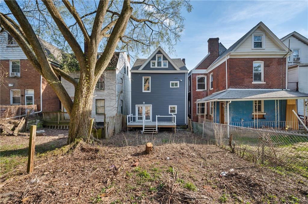 5419 Broad Street Pittsburgh, PA 15206 - Photo 28 of 29 a house that has a tree in front of the house