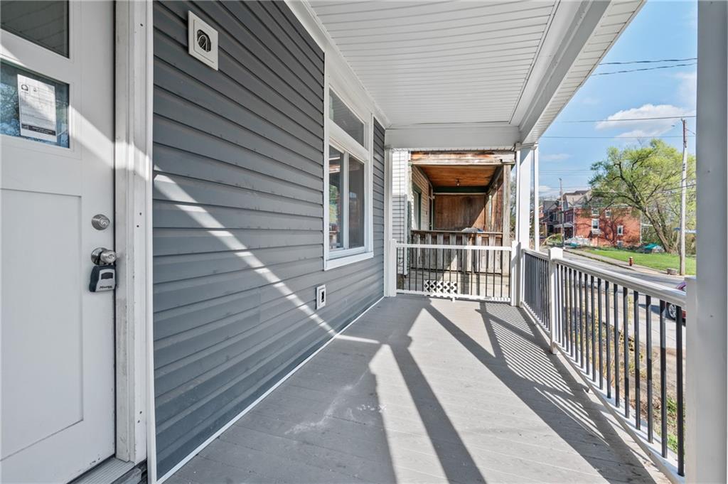 5419 Broad Street Pittsburgh, PA 15206 - Photo 3 of 29 a view of a balcony with wooden floor