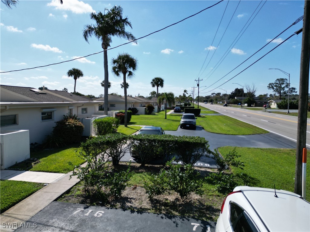720 Joel Boulevard Lehigh Acres, FL 33936 - Photo 5 of 9 a view of a garden