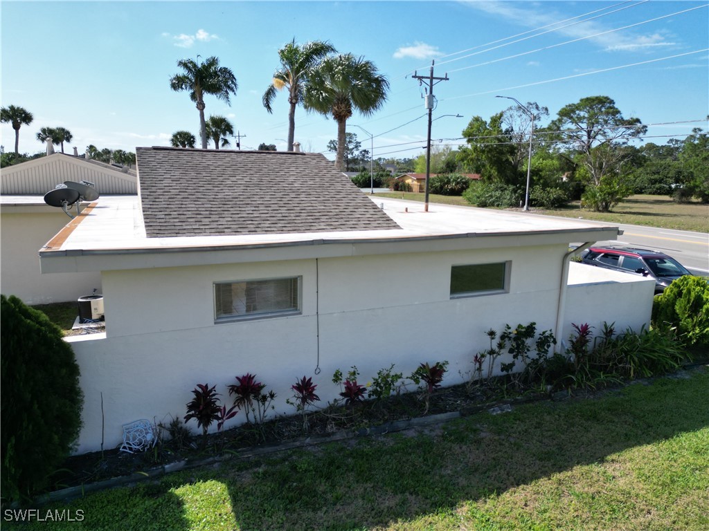 720 Joel Boulevard Lehigh Acres, FL 33936 - Photo 7 of 9 a view of house and outdoor space