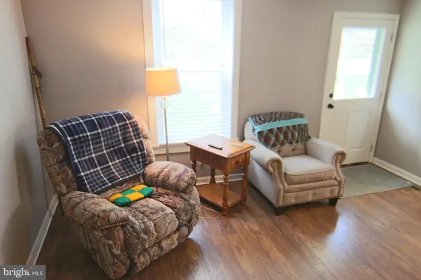 a bedroom with bed and a window