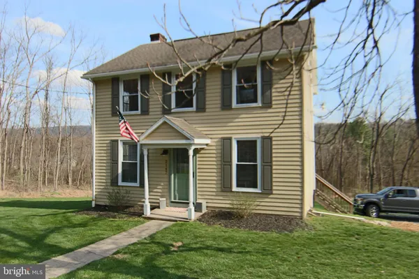a view of a back yard of the house