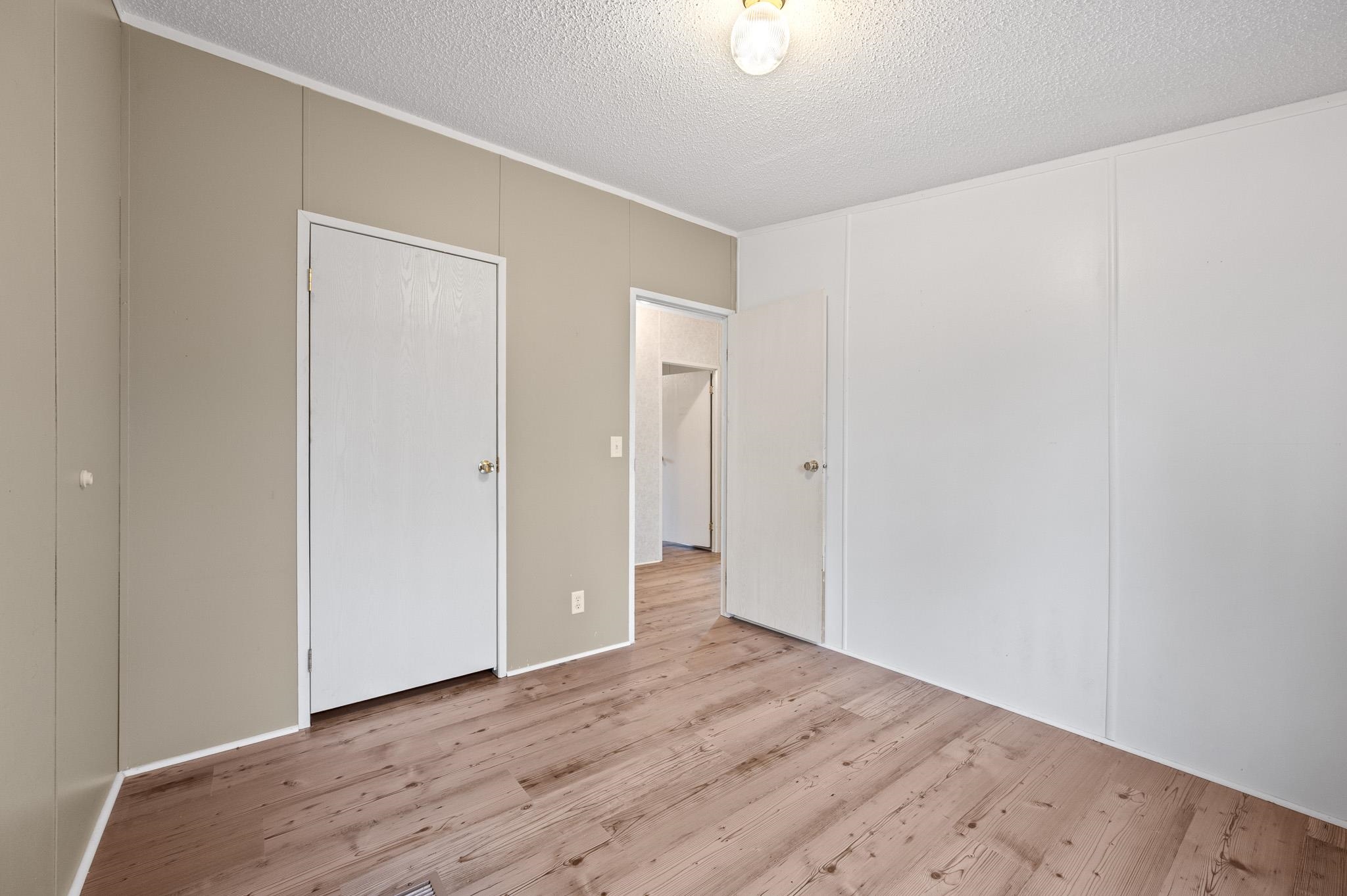 140 Garford Road Madison Heights, VA 24572 - Photo 19 of 32 a view of an empty room with wooden floor