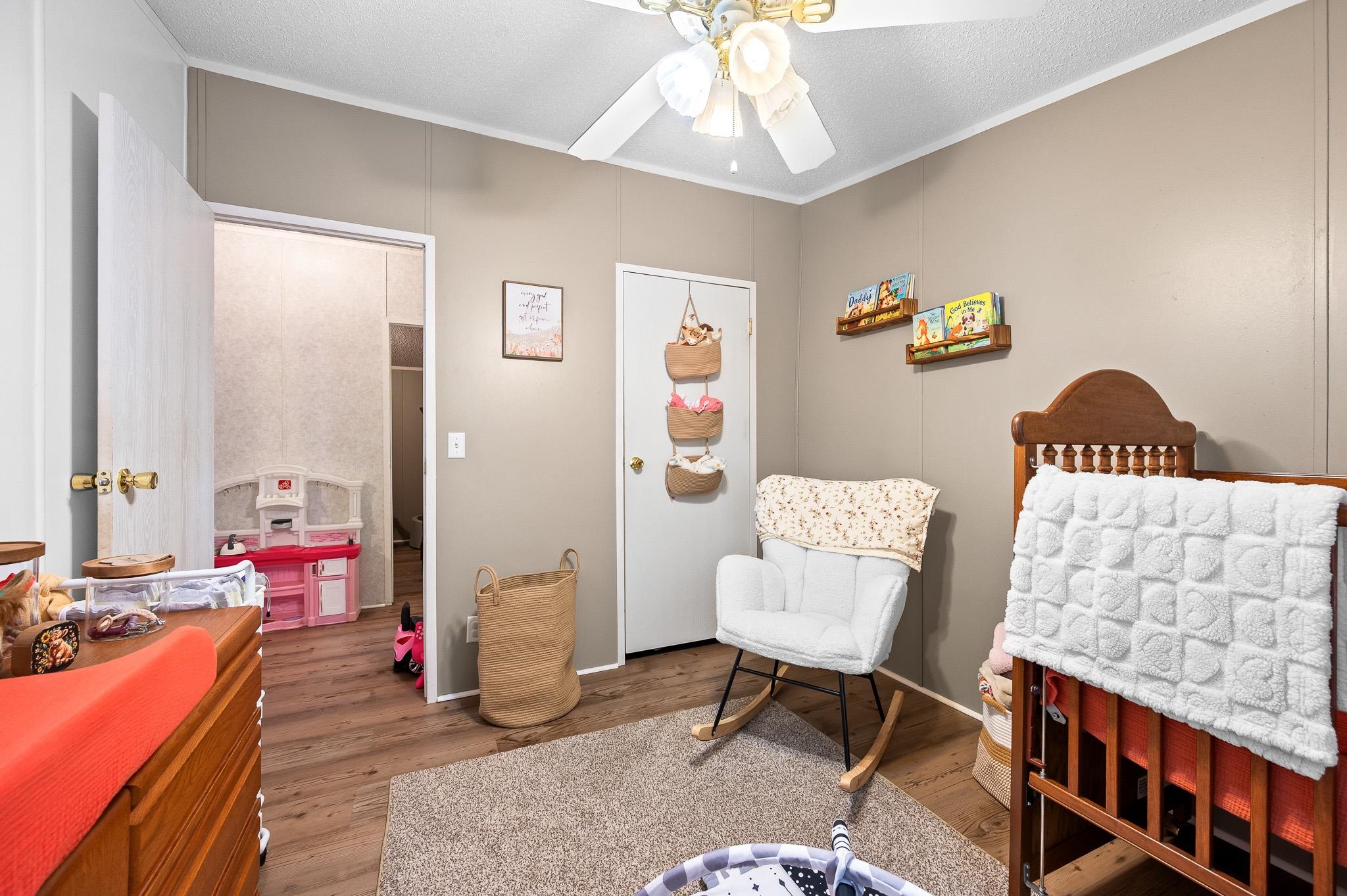 140 Garford Road Madison Heights, VA 24572 - Photo 22 of 35 a living room with furniture and a dining table