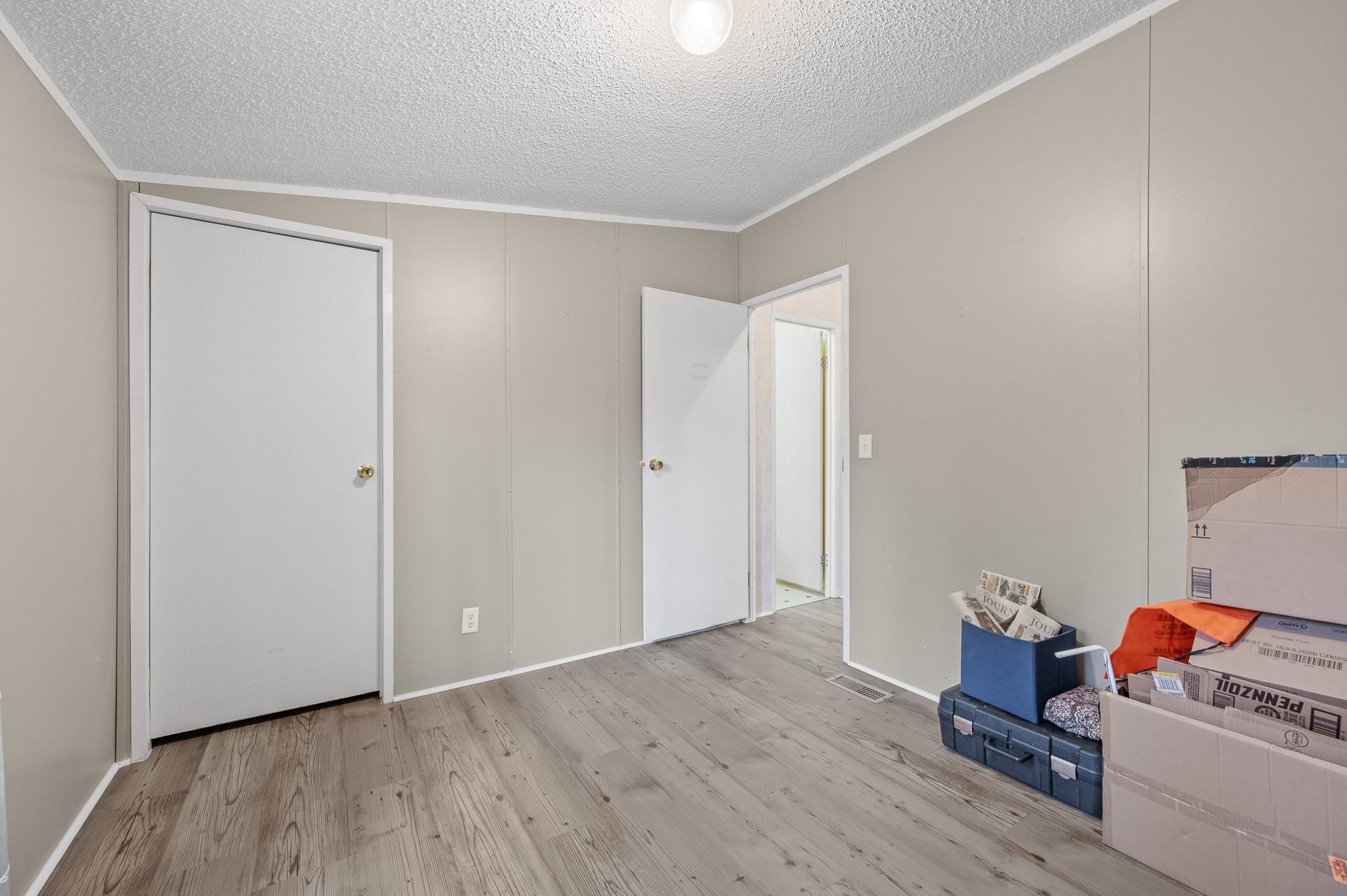 140 Garford Road Madison Heights, VA 24572 - Photo 23 of 32 a room with furniture and wooden floor