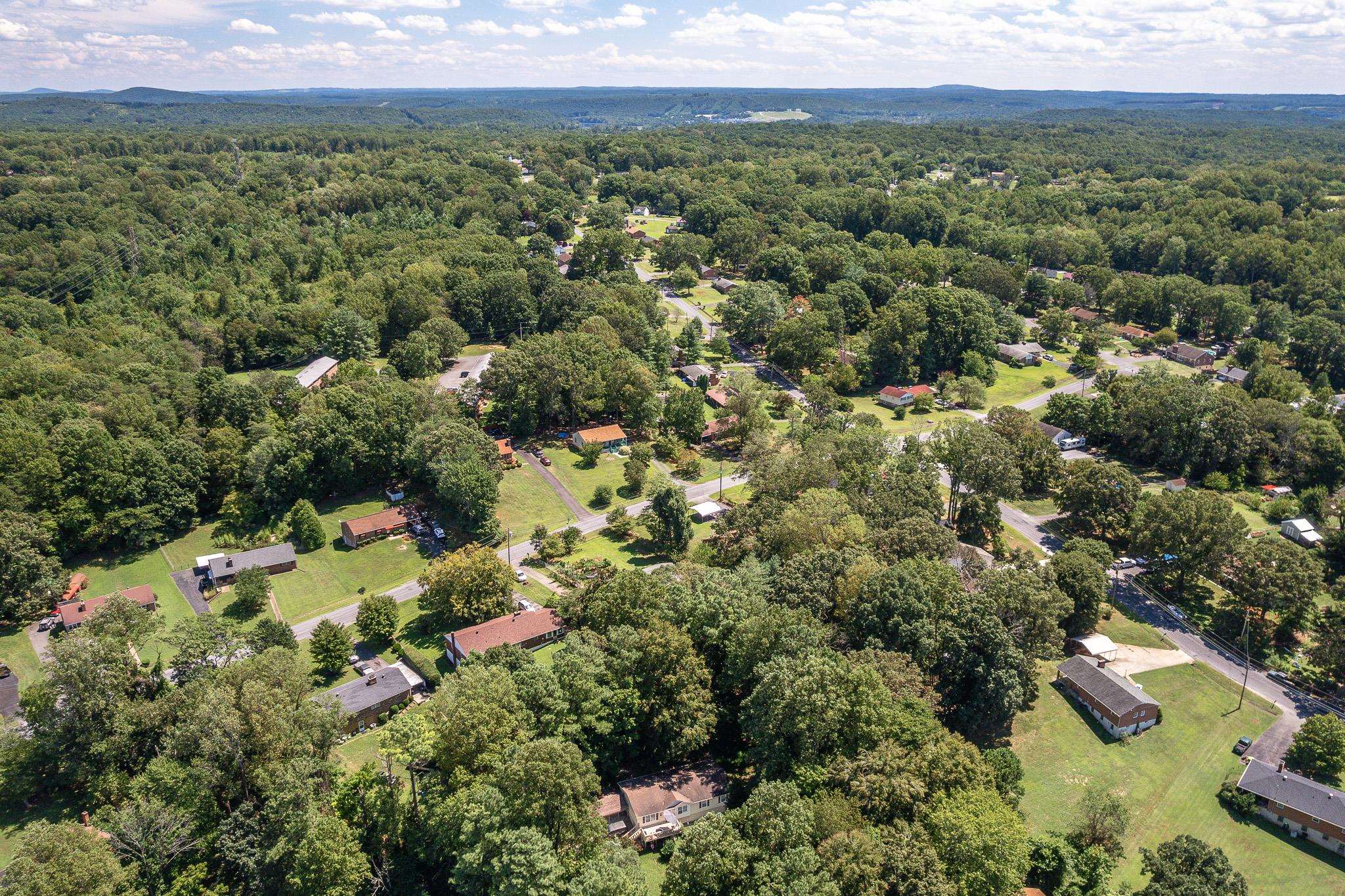 140 Garford Road Madison Heights, VA 24572 - Photo 30 of 32 an aerial view of a town with trees