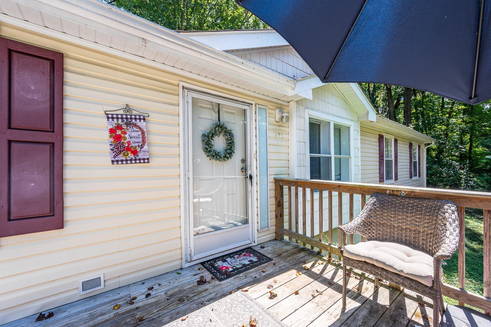 140 Garford Road Madison Heights, VA 24572 - Photo 3 of 32 a view of a patio with wooden floor