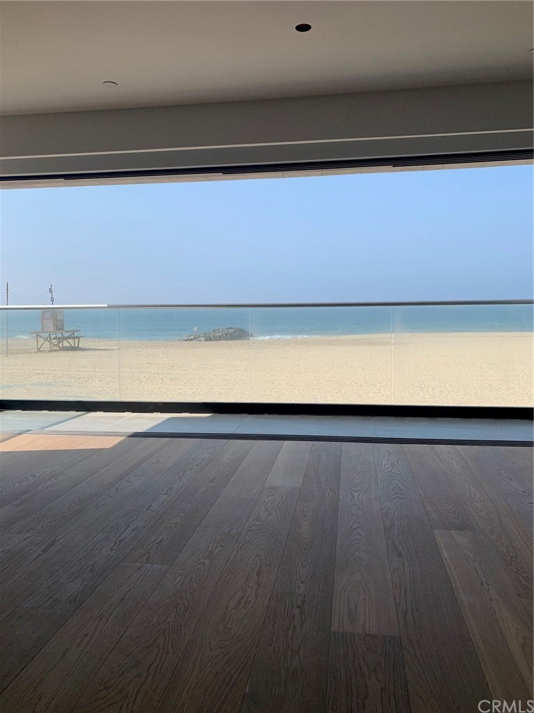 5205 Seashore Drive Newport Beach, CA 92663 - Photo 4 of 10 a view of an empty room with a window