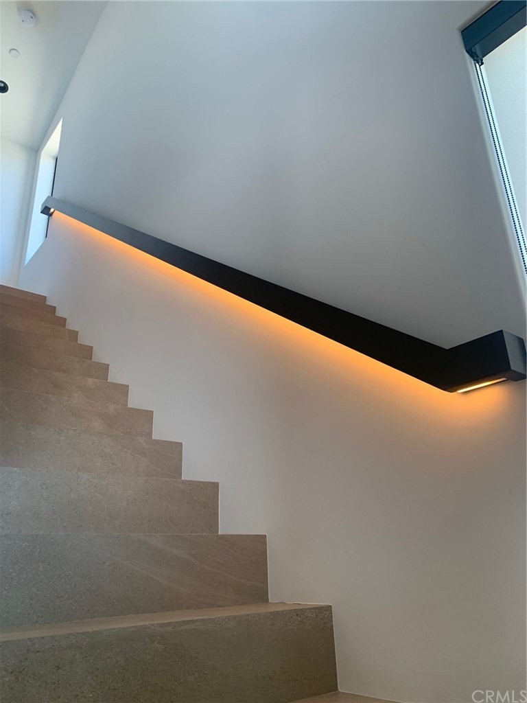 5205 Seashore Drive Newport Beach, CA 92663 - Photo 9 of 10 a view of staircase with sky view