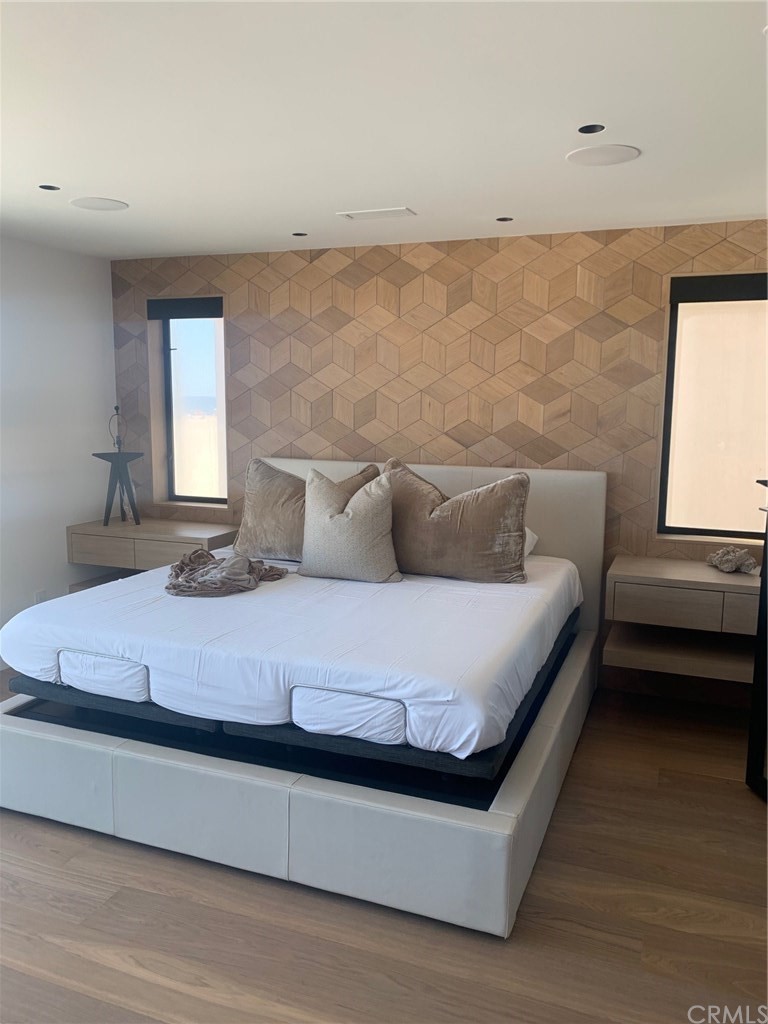 5205 Seashore Drive Newport Beach, CA 92663 - Photo 10 of 10 a bedroom with a bed and window