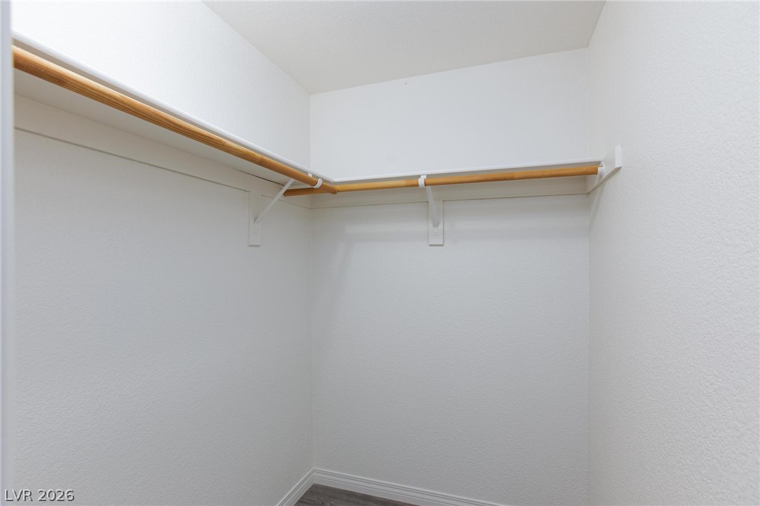 2254 Ramsgate Drive Henderson, NV 89074 - Photo 20 of 43 Ample hanging space and shelving define this practical walk-in closet, ready for organization.