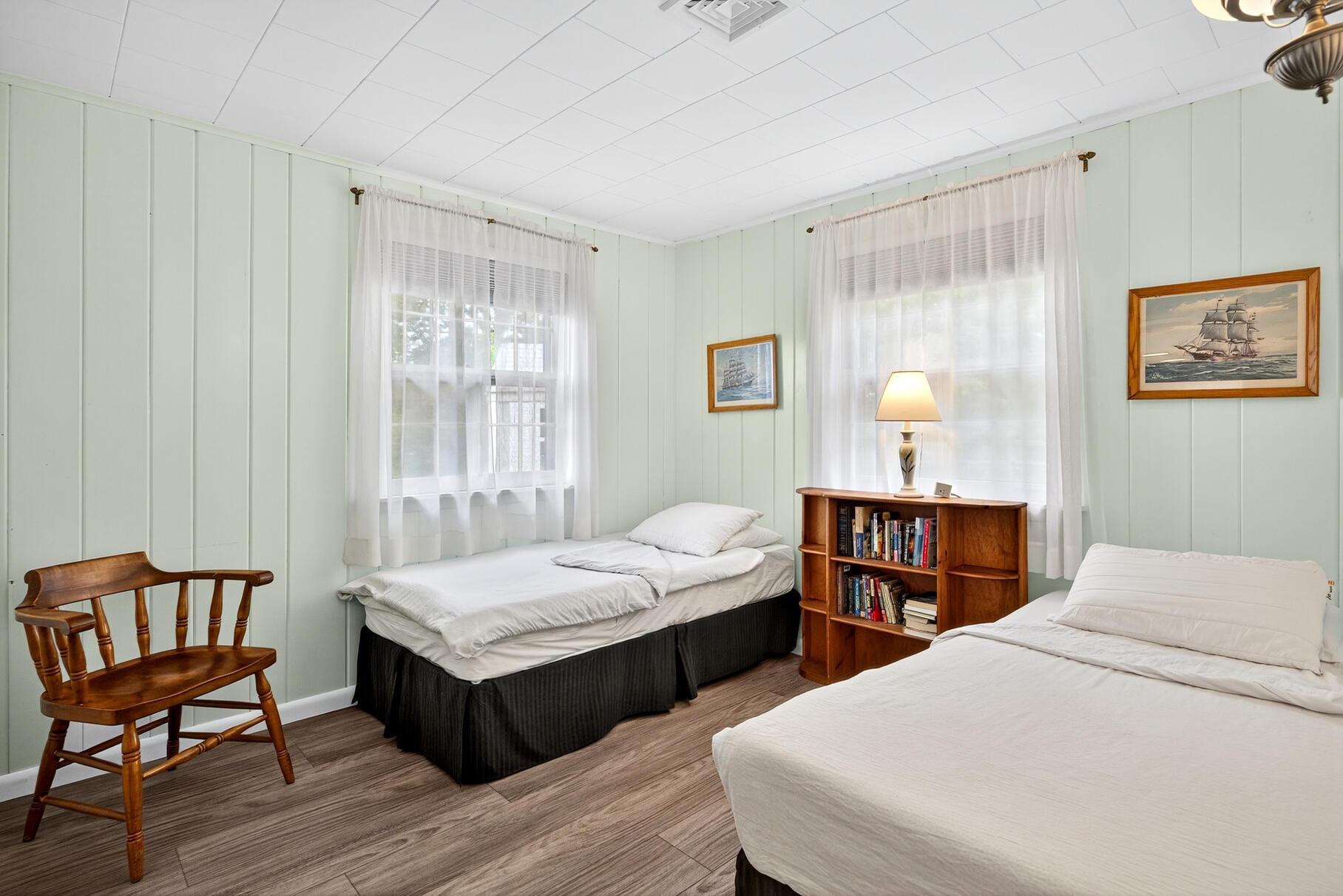 46 Hiram Hill Road Wellfleet, MA 02667 - Photo 15 of 36 a bedroom with two beds and a chair
