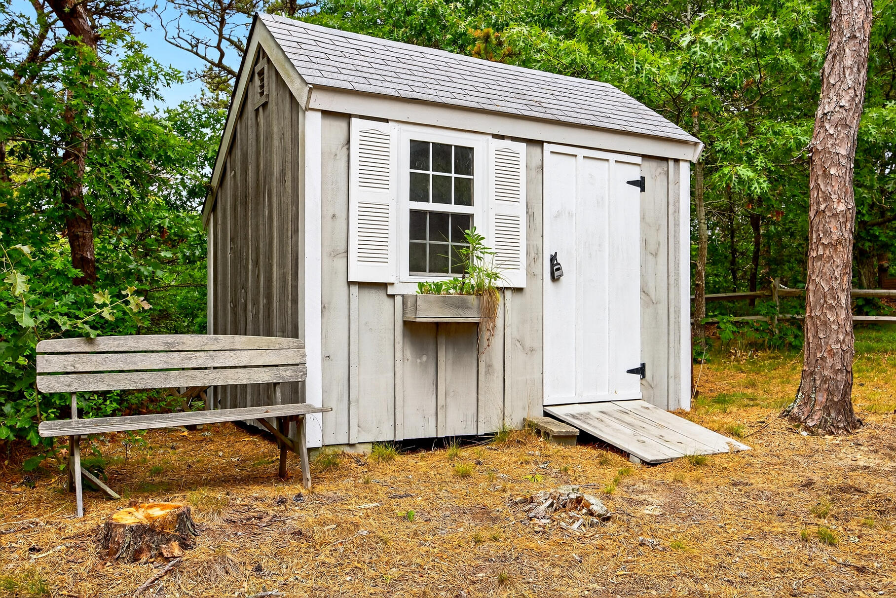 46 Hiram Hill Road Wellfleet, MA 02667 - Photo 19 of 36 a backyard of a house with seating space