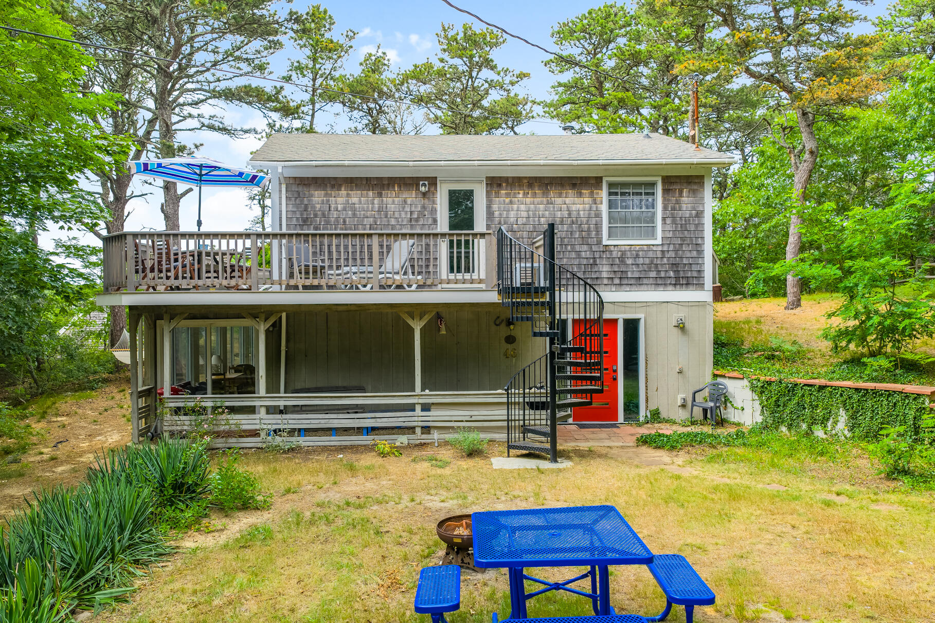 46 Hiram Hill Road Wellfleet, MA 02667 - Photo 30 of 36 a view of a house with pool