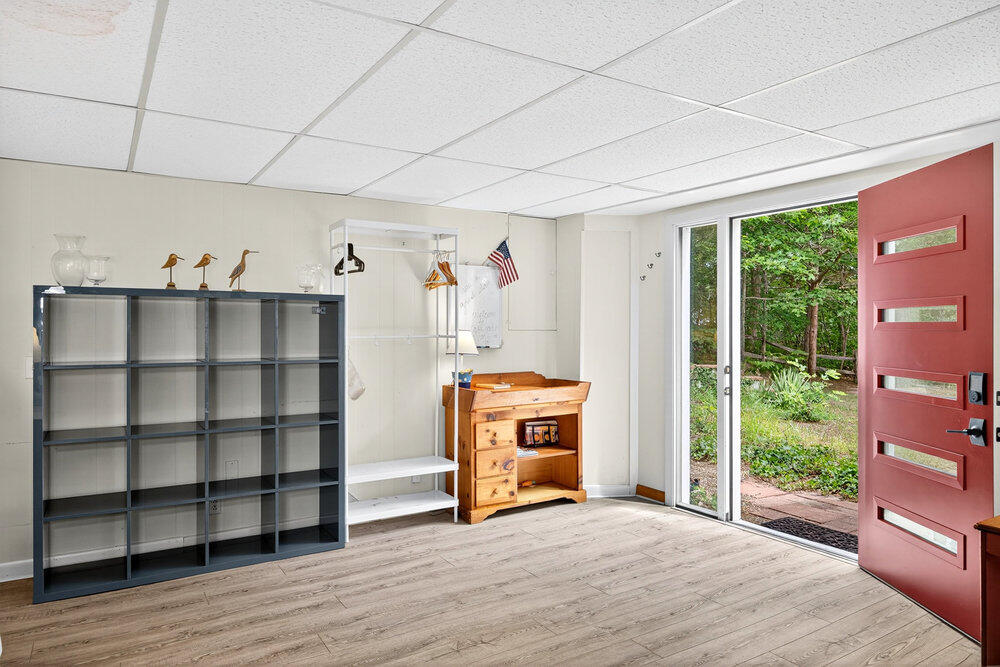 46 Hiram Hill Road Wellfleet, MA 02667 - Photo 35 of 36 a view of a livingroom with a large window and wooden floor