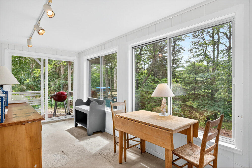 46 Hiram Hill Road Wellfleet, MA 02667 - Photo 6 of 36 a dining room with furniture and a window