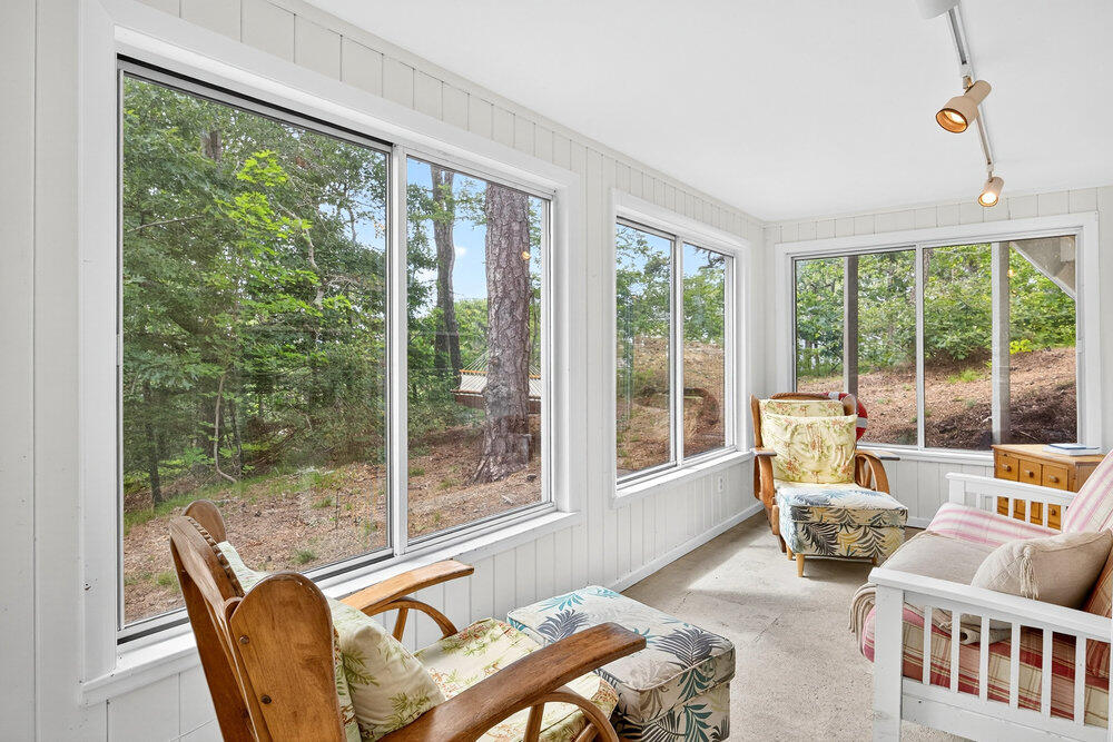 46 Hiram Hill Road Wellfleet, MA 02667 - Photo 7 of 36 a living room with furniture and a large window
