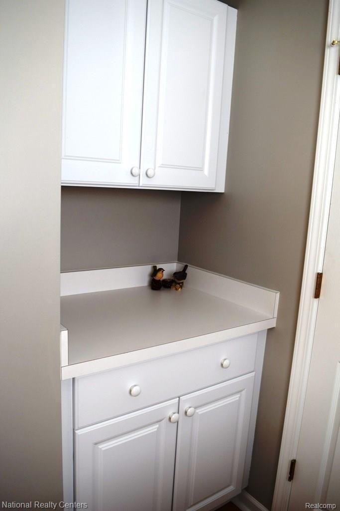19917 Rensellor Street Livonia, MI 48152 - Photo 8 of 12 Laundry Room Cabinet.JPG