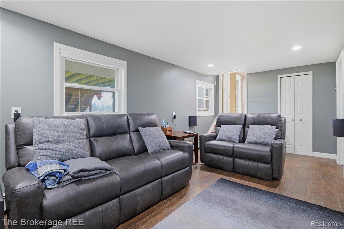 261 Reymont Road Waterford, MI 48327 - Photo 14 of 49 Spacious room featuring wood-finish flooring, recessed lighting, and crisp white trim