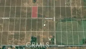 a view of a gate and fence