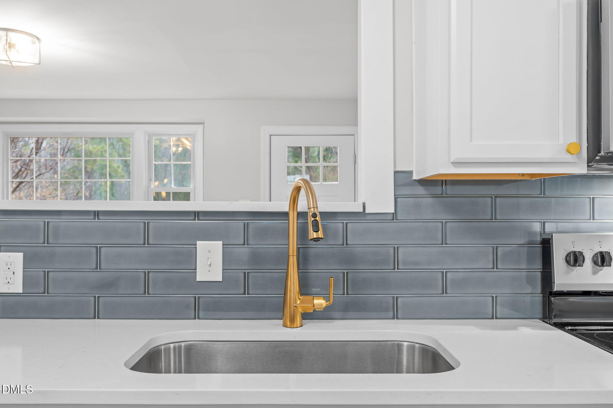 2239 Rumson Road Raleigh, NC 27610 - Photo 18 of 39 a kitchen with a sink and a window