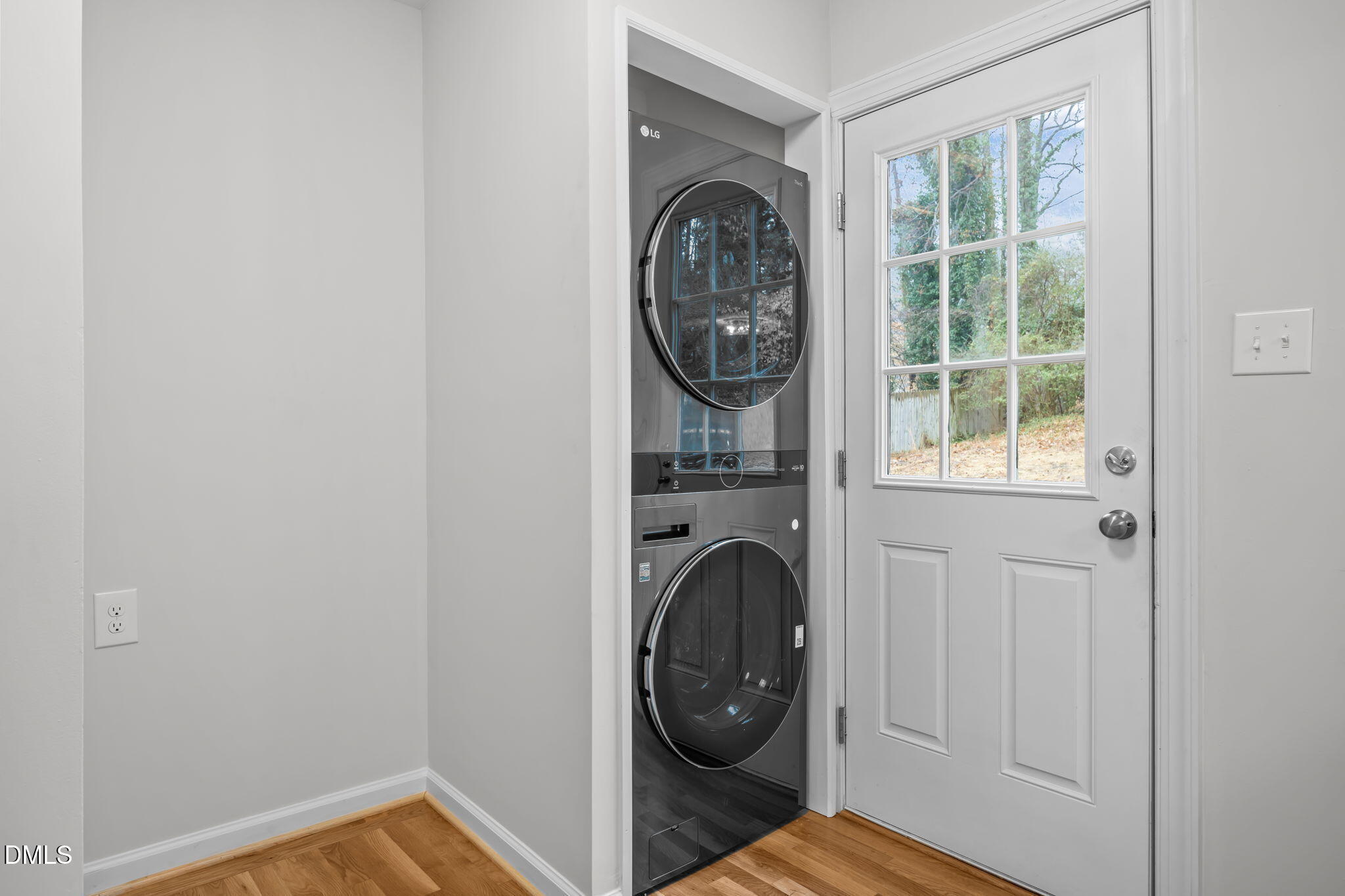 2239 Rumson Road Raleigh, NC 27610 - Photo 23 of 39 a view of a hallway with washer and dryer