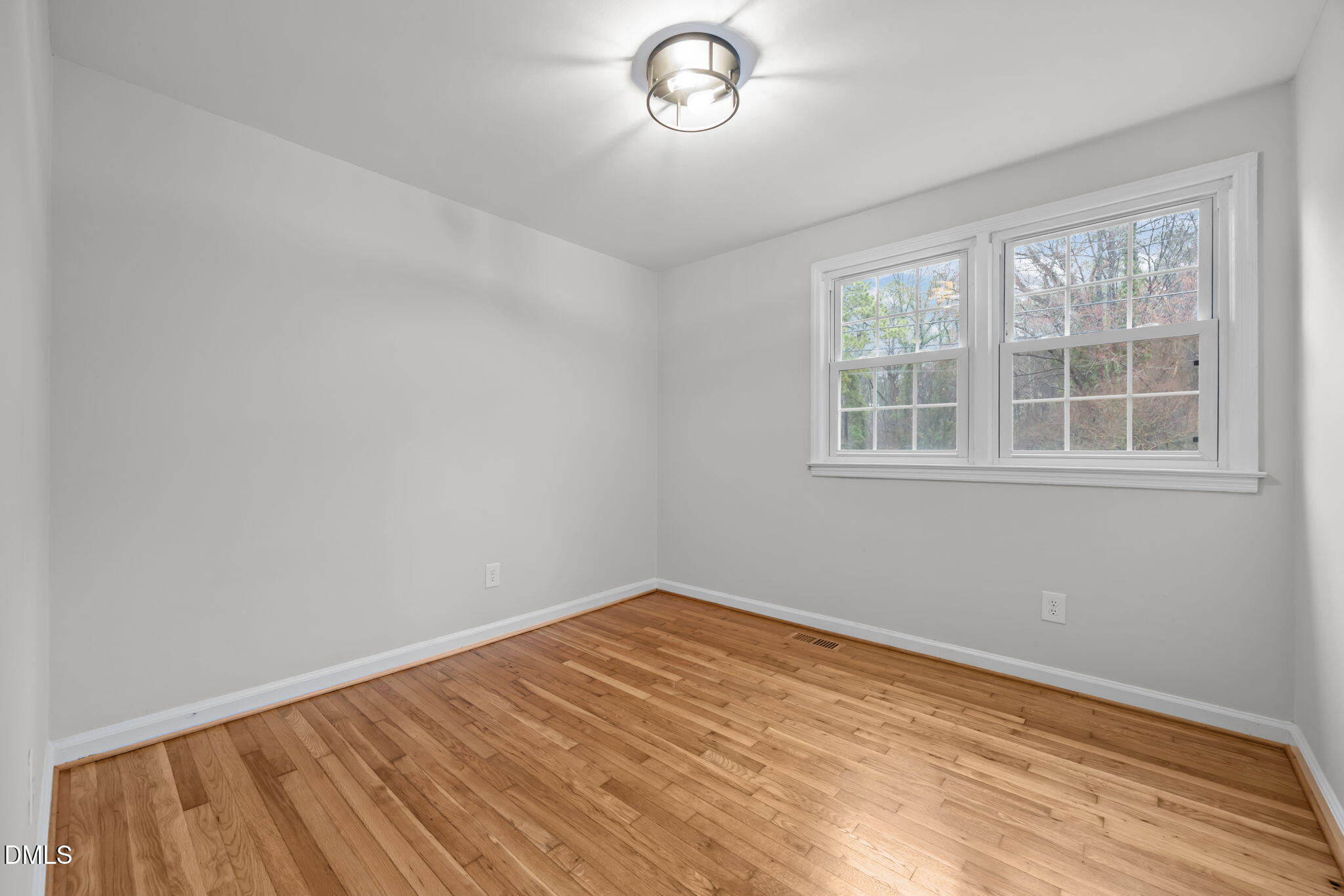 2239 Rumson Road Raleigh, NC 27610 - Photo 25 of 39 an empty room with a window