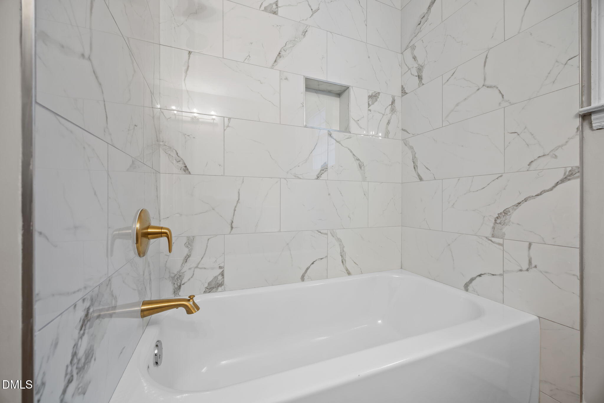 2239 Rumson Road Raleigh, NC 27610 - Photo 30 of 39 a bathroom with bathtub