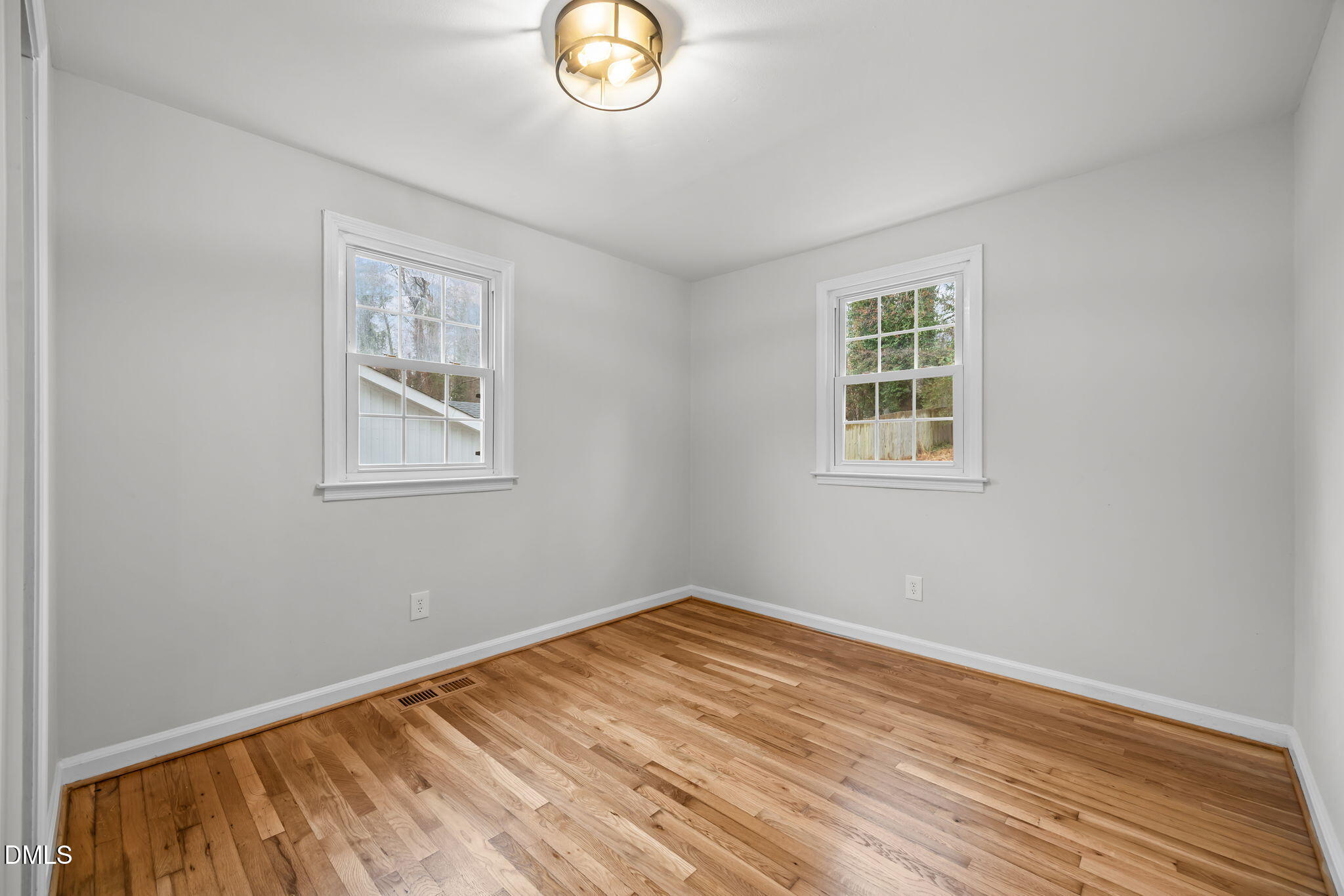 2239 Rumson Road Raleigh, NC 27610 - Photo 31 of 39 an empty room with a window