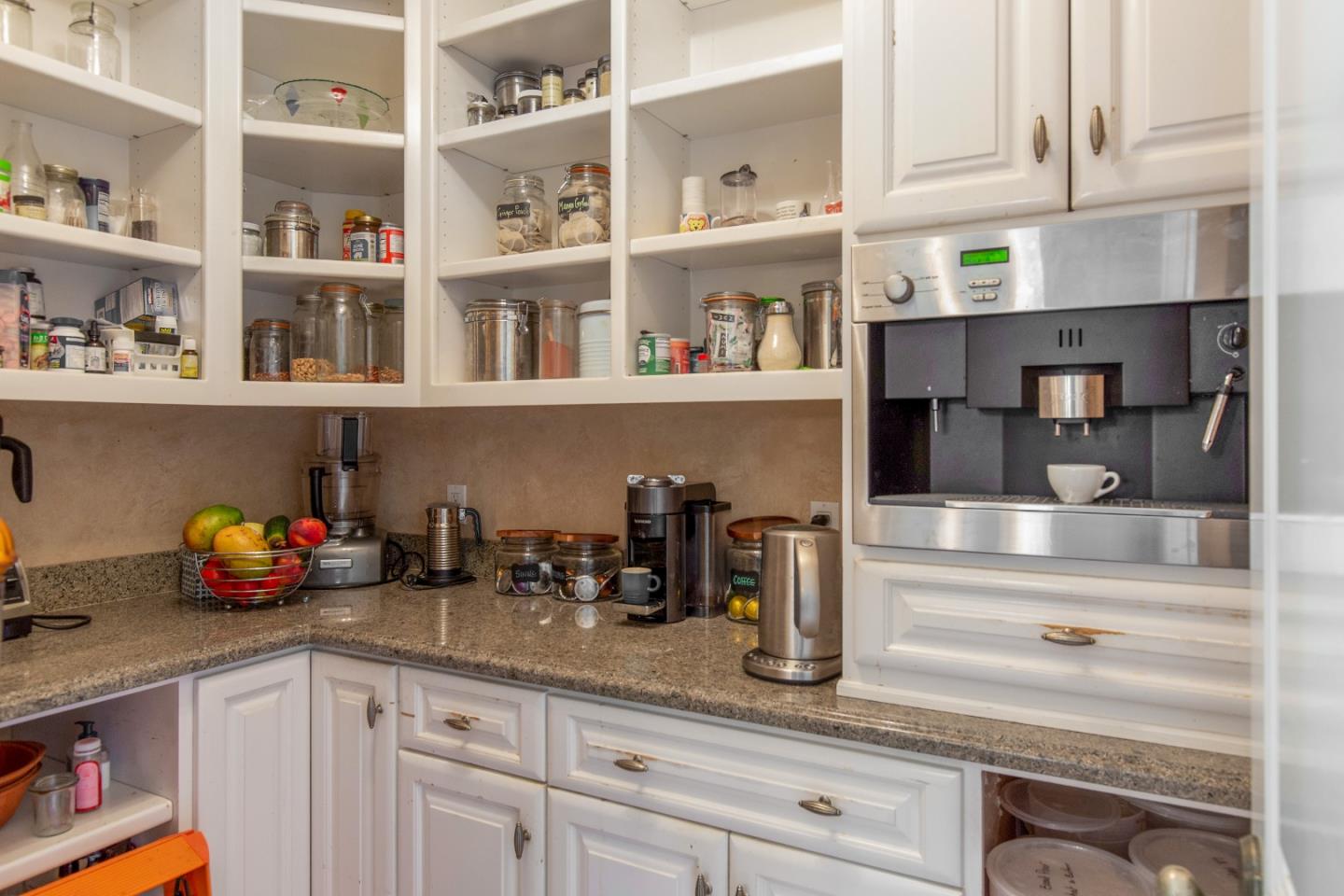240 Laning Drive Woodside, CA 94062 - Photo 11 of 35 a kitchen with white cabinets and a wooden floor