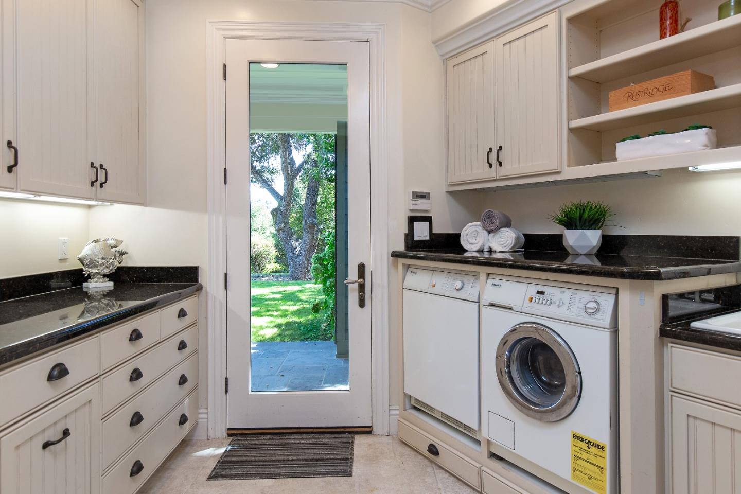 240 Laning Drive Woodside, CA 94062 - Photo 14 of 35 a utility room with sink dryer and washer