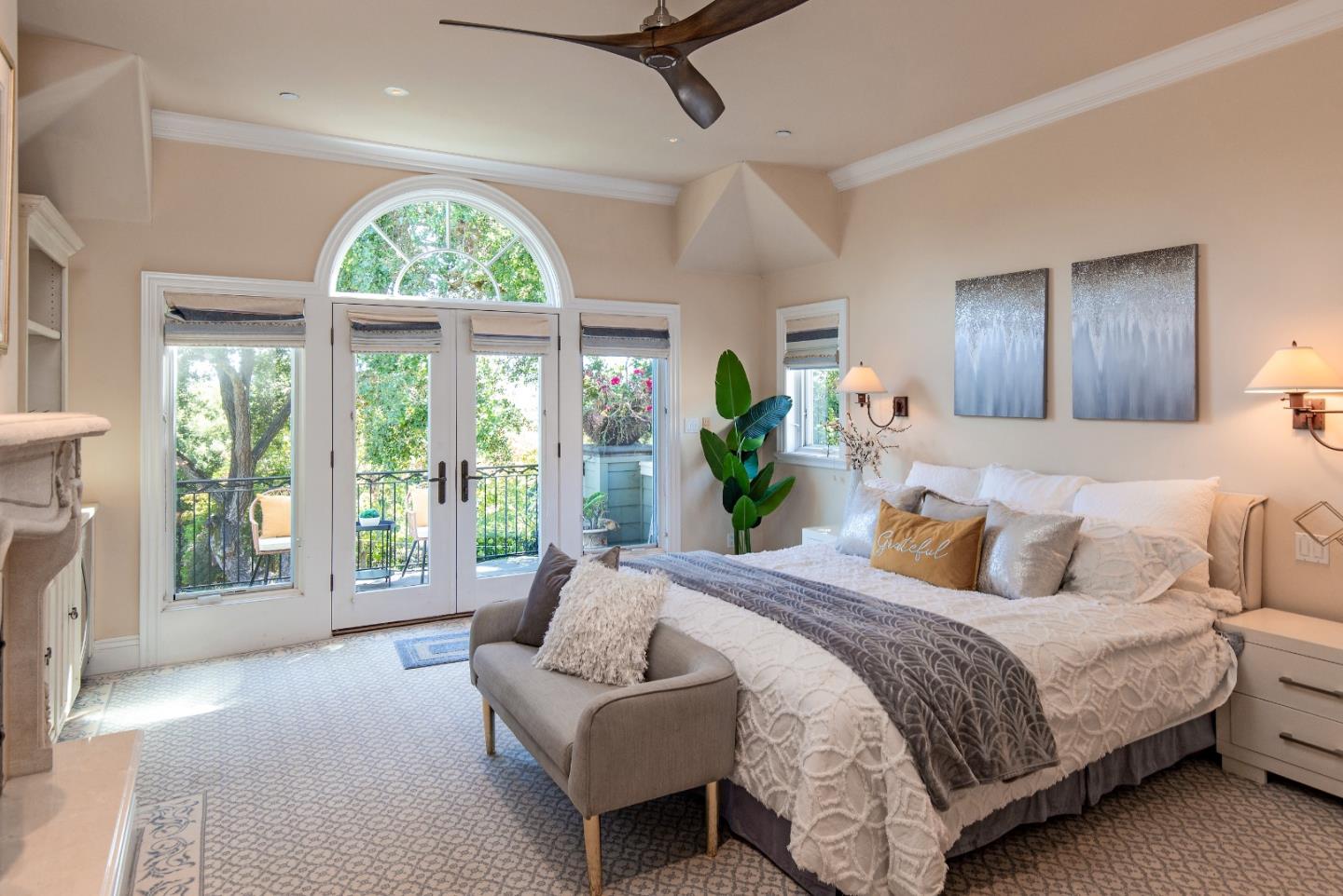 240 Laning Drive Woodside, CA 94062 - Photo 20 of 35 a bedroom with a balcony a bed and a large window