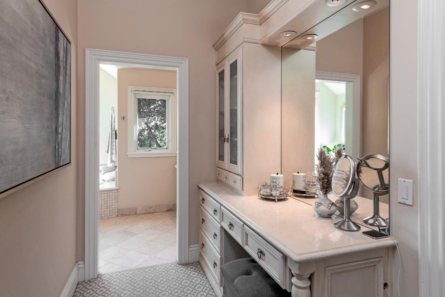 240 Laning Drive Woodside, CA 94062 - Photo 21 of 35 a bathroom with a sink vanity granite tub and a mirror