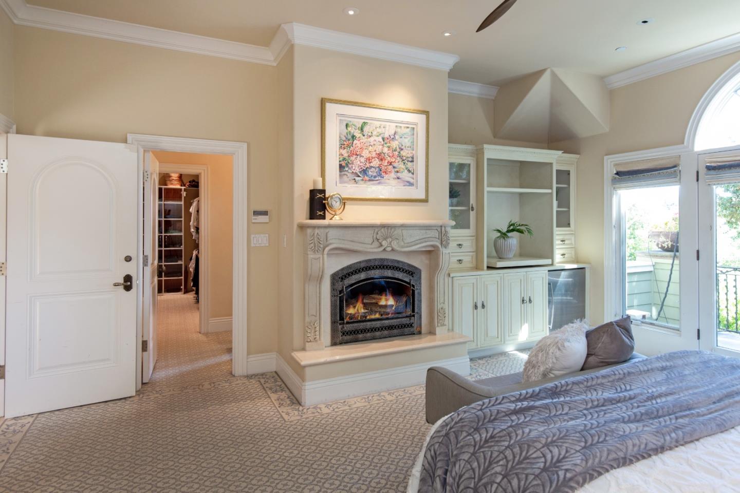 240 Laning Drive Woodside, CA 94062 - Photo 22 of 35 a living room with furniture and a fireplace