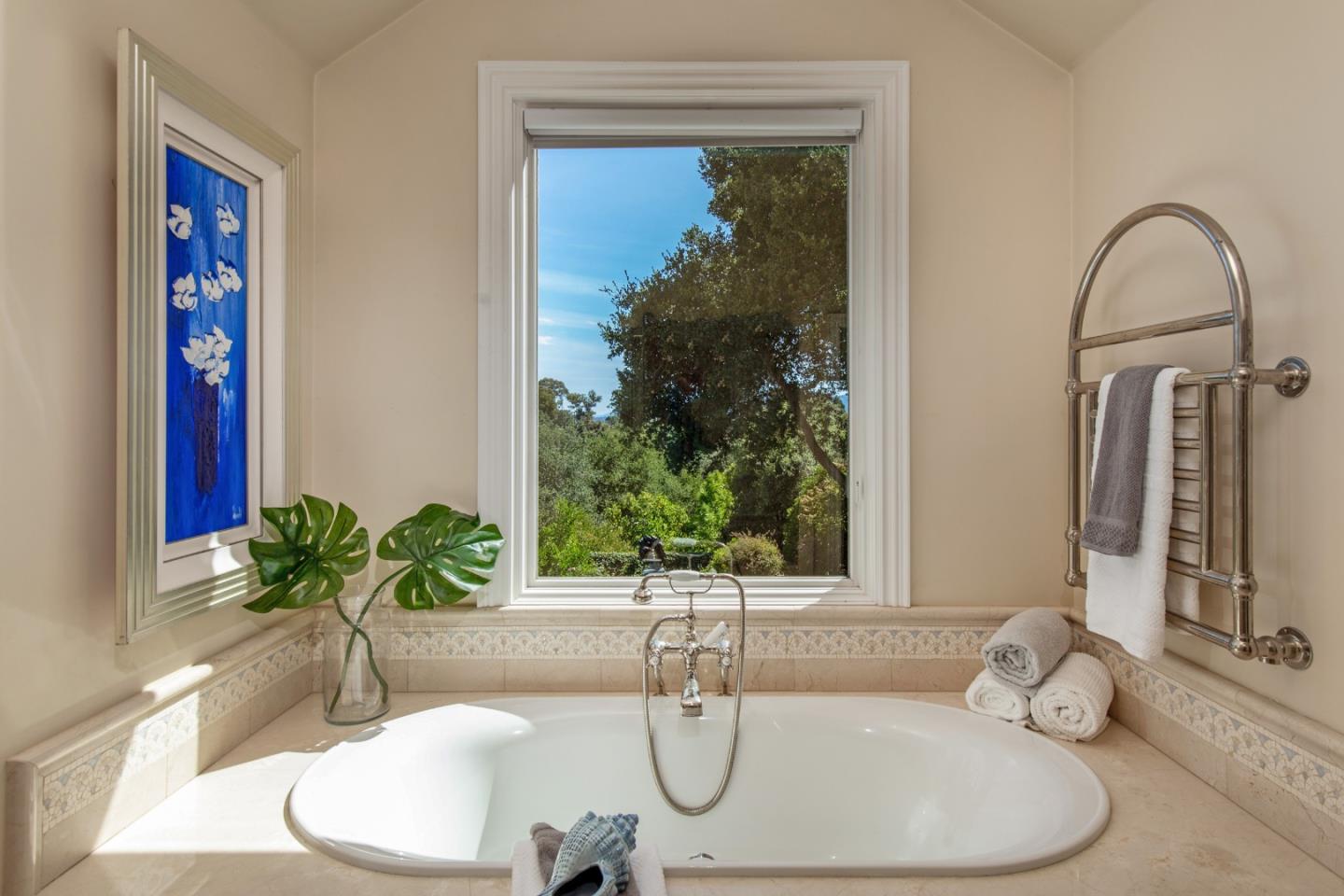 240 Laning Drive Woodside, CA 94062 - Photo 25 of 35 a bathroom with a granite countertop sink a mirror and vanity