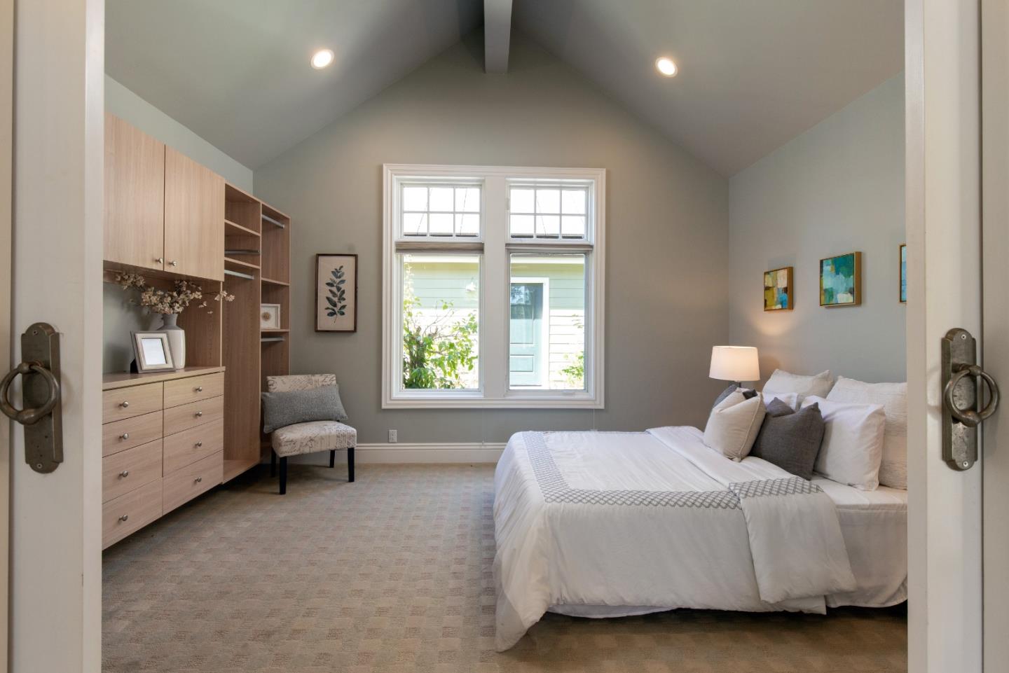 240 Laning Drive Woodside, CA 94062 - Photo 30 of 35 a bedroom with a bed and a large window