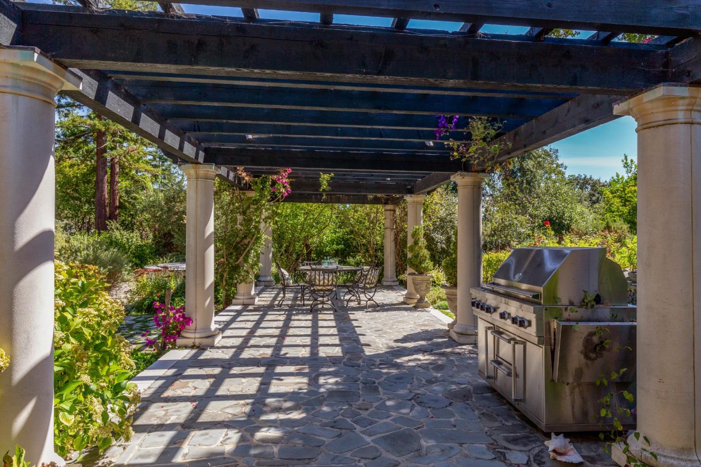 240 Laning Drive Woodside, CA 94062 - Photo 34 of 35 a view of a chairs and table in the patio