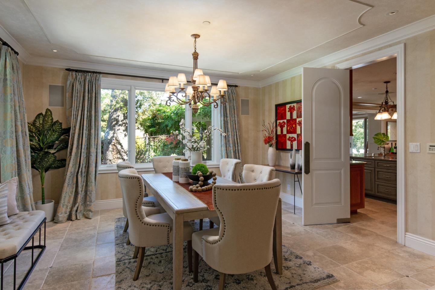 240 Laning Drive Woodside, CA 94062 - Photo 5 of 35 a dining room with furniture a chandelier and window