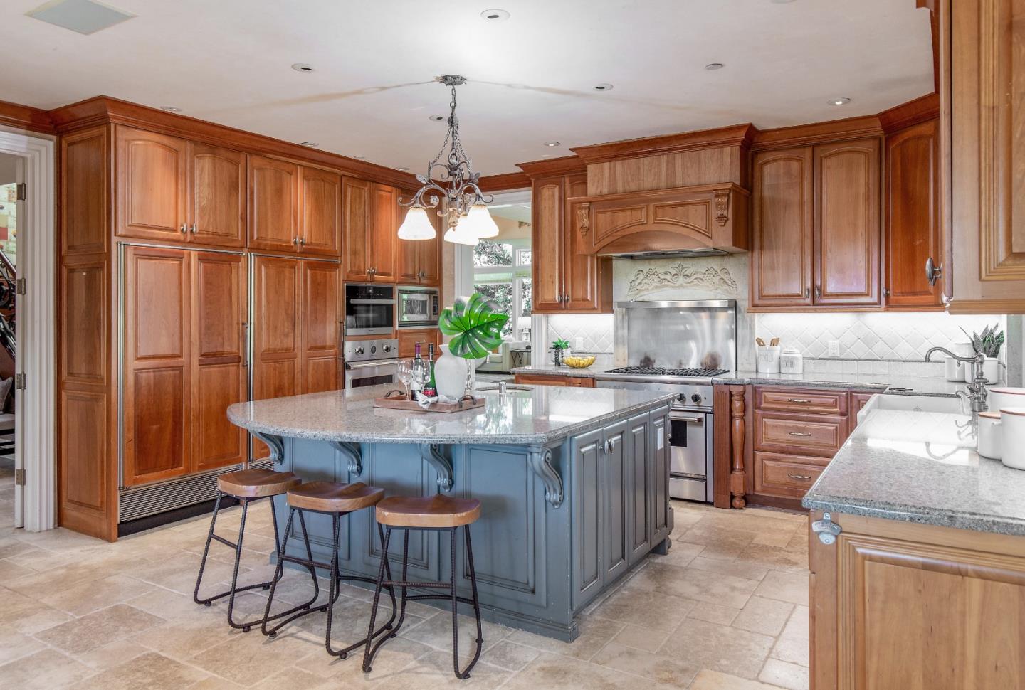 240 Laning Drive Woodside, CA 94062 - Photo 6 of 35 a kitchen with granite countertop a sink appliances and cabinets